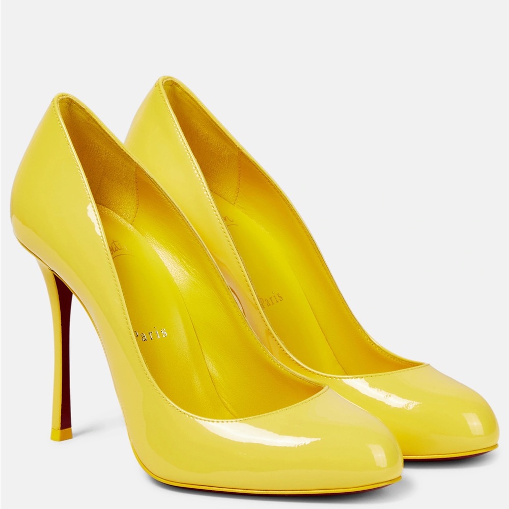 CHRISTIAN LOUBOUTIN
Dolly patent leather pumps- yellow